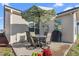 Outdoor patio with table, chairs, and umbrella for relaxation and entertainment at 4020 Kinsley Trce, Burlington, NC 27215