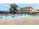 Community pool with water features, lounge chairs, and covered seating, ideal for Gathering fun and relaxation at 4020 Kinsley Trce, Burlington, NC 27215