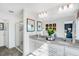 Spacious bathroom with granite countertops, dual sinks, and a glass-enclosed shower at 410 Rowe Way, Knightdale, NC 27545