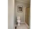 Clean bathroom featuring a standard toilet and glass-enclosed shower at 4172 Copeland Ter, Graham, NC 27253