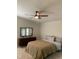 Cozy bedroom with ceiling fan and modern dresser at 4172 Copeland Ter, Graham, NC 27253