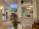 Open-concept living area showcasing views of the kitchen and dining space at 4172 Copeland Ter, Graham, NC 27253