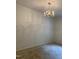 Cozy living room with chandelier and carpet, offering a comfortable space at 4172 Copeland Ter, Graham, NC 27253