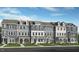 New townhome construction featuring varying gray and white exterior paint schemes at 418 Rowe Way, Knightdale, NC 27545