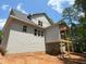 Exterior view shows siding with a partially finished, covered back deck area at 485 Chapel Ridge Dr, Pittsboro, NC 27312