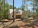 New home under construction, exterior view showcasing framing and roof sheathing at 485 Chapel Ridge Dr, Pittsboro, NC 27312