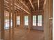 Framing of a foyer with double door entry and large windows, new home construction at 485 Chapel Ridge Dr, Pittsboro, NC 27312