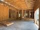 Garage in mid-construction stage, highlighting unfinished walls and spacious interior at 485 Chapel Ridge Dr, Pittsboro, NC 27312