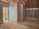 Unfinished interior featuring framed walls and visible installation for the walls at 485 Chapel Ridge Dr, Pittsboro, NC 27312