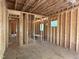 Framing for future open living area featuring wall framing, open spaces and natural light at 485 Chapel Ridge Dr, Pittsboro, NC 27312