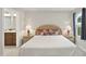 Cozy bedroom with neutral tones, bedside tables, and a view to an attached bathroom at 55 Boots Ridge Way, Franklinton, NC 27525
