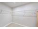 Walk-in closet with wire shelving for ample storage, ready for organizing clothes and accessories at 55 Boots Ridge Way, Franklinton, NC 27525