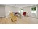 Bright living room features hardwood floors and neutral walls, creating a welcoming atmosphere at 55 Boots Ridge Way, Franklinton, NC 27525