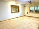 View of the carpeted basement featuring a window and ceiling fan at 5500 Fortunes Ridge Dr # 82B, Durham, NC 27713