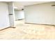 Large basement area showcasing the carpet flooring and potential for customization at 5500 Fortunes Ridge Dr # 82B, Durham, NC 27713