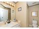Modest bathroom with a single sink, a mirror with vanity lighting, and a shower behind a curtain at 5500 Fortunes Ridge Dr # 82B, Durham, NC 27713