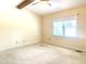 Bedroom with neutral carpet, a ceiling fan, and one large window at 5500 Fortunes Ridge Dr # 82B, Durham, NC 27713