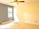 Simple bedroom featuring neutral carpet and light-colored walls at 5500 Fortunes Ridge Dr # 82B, Durham, NC 27713