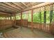 This covered deck with lattice features a view of the surrounding trees at 5500 Fortunes Ridge Dr # 82B, Durham, NC 27713