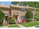 Charming brick townhome with well-maintained landscaping and inviting entryway in a quiet neighborhood at 5500 Fortunes Ridge Dr # 82B, Durham, NC 27713