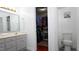 This bathroom has vanity with a neutral countertop, toilet, and walk-in closet at 5600 Treestand Ct, Garner, NC 27529
