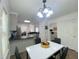 Eat-in kitchen with modern appliances and adjacent dining area at 5600 Treestand Ct, Garner, NC 27529