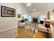 Bright living room features a fireplace, vaulted ceiling, and stylish neutral decor at 5600 Treestand Ct, Garner, NC 27529