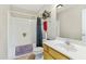 Bright bathroom with tub/shower combo and a functional single sink vanity at 5860 Andover Dr, Graham, NC 27253