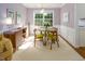 Stylish dining room with modern lighting and elegant decor, creating a sophisticated ambiance at 612 Spring Meadow Dr, Durham, NC 27713