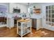 Modern kitchen with white cabinets and stainless steel appliances, designed for functionality and style at 612 Spring Meadow Dr, Durham, NC 27713
