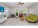 Spacious living room with ample natural light and neutral decor, ideal for relaxation at 612 Spring Meadow Dr, Durham, NC 27713