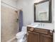 Bathroom featuring a walk-in shower and updated vanity at 6824 Wood Forest Dr, Cary, NC 27519