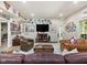 Cozy living room with comfortable seating, wood accents, and unique wall decor at 6824 Wood Forest Dr, Cary, NC 27519