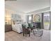 Serene main bedroom with elegant decor, comfortable seating area, and a large window view at 75 Cordoba Dr, Franklinton, NC 27525