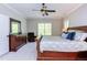 Bedroom with large window and sleigh bed at 7633 Summer Pines Way, Wake Forest, NC 27587