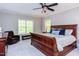 Bedroom with large windows and ceiling fan at 7633 Summer Pines Way, Wake Forest, NC 27587