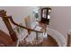 Elegant foyer featuring hardwood floors, curved staircase, and a beautiful entryway at 7633 Summer Pines Way, Wake Forest, NC 27587