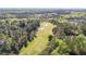 Scenic golf course view with lush green fairways and mature trees on the property at 7633 Summer Pines Way, Wake Forest, NC 27587