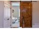 Hallway featuring a barn door with a glimpse into a cozy living room at 7633 Summer Pines Way, Wake Forest, NC 27587
