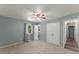 Bedroom featuring a window, closet, ceiling fan, and neutral colored walls at 7653 Summerglen Dr, Raleigh, NC 27615