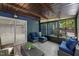 Enclosed patio with comfortable seating, perfect for entertaining at 7653 Summerglen Dr, Raleigh, NC 27615