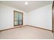 Bedroom featuring neutral carpet and a window that provides natural light at 7716 Bluff Top Court Ct, Raleigh, NC 27615