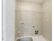 Laundry room featuring washer and dryer hookups, and a single wire shelf at 7728 Cape Charles Dr, Raleigh, NC 27617