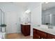 Bathroom featuring double sinks and a neutral color palette at 792 Eldridge Loop, Cary, NC 27519