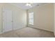 Neutral bedroom featuring carpet, a window and a door at 792 Eldridge Loop, Cary, NC 27519