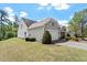 Exterior elevation features white siding, a garage, and an adjacent well-kept lawn at 792 Eldridge Loop, Cary, NC 27519