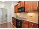 Well-equipped kitchen with granite counters and stainless steel appliances at 792 Eldridge Loop, Cary, NC 27519