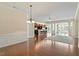 Expansive living room showcases an open floor plan and hardwood flooring throughout at 792 Eldridge Loop, Cary, NC 27519
