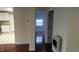 Interior view of home showing hardwood floors, kitchen access, and a hallway at 82 Whisper Ln, Pittsboro, NC 27312