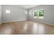 Bright, airy bedroom with ample natural light highlighting the pristine walls and lovely floors at 90 Cordoba Dr, Franklinton, NC 27525